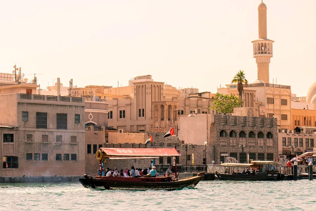 An abra crossing Dubai Creek towards old Dubai